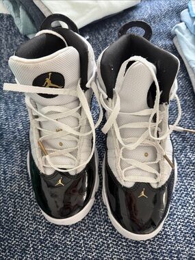Jordan Kids Black, White and Gold High-Top Sneakers